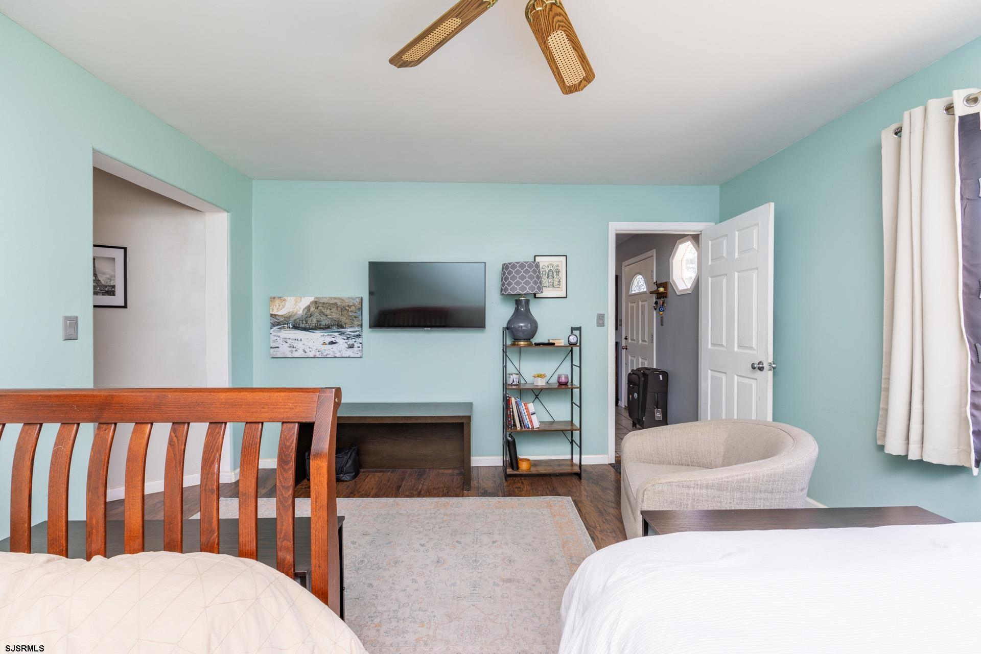 3121 North Rte 9 Ocean View, NJ 08230 - Photo 13 of 68 a bedroom with furniture and a fireplace