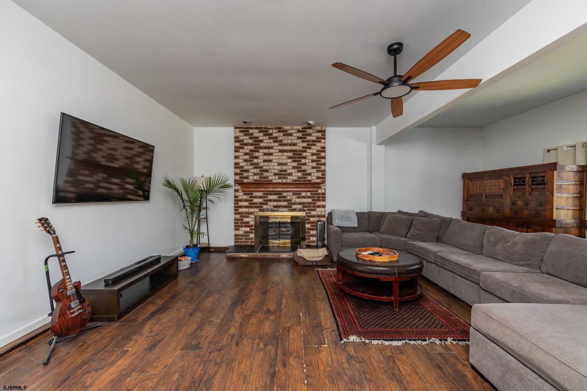 3121 North Rte 9 Ocean View, NJ 08230 - Photo 9 of 68 a living room with furniture and wooden floor
