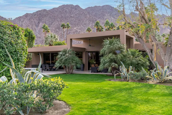 a view of a house with a garden