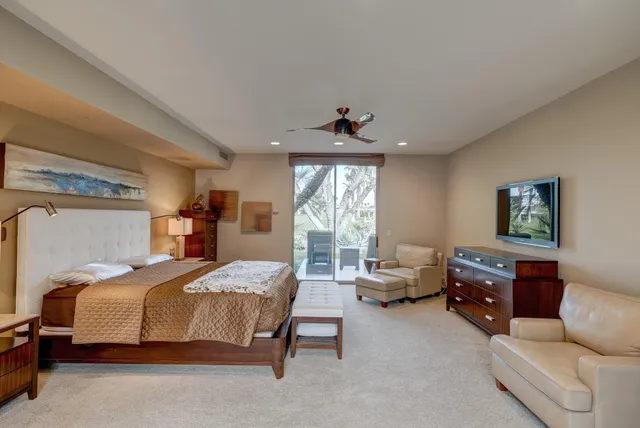 a bedroom with a bed and furniture