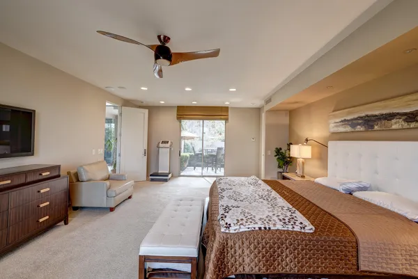 a bed room with a bed and furniture