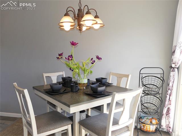 6345 Bismark Road Colorado Springs, CO 80922 - Photo 3 of 29 Dining area - LVP floors