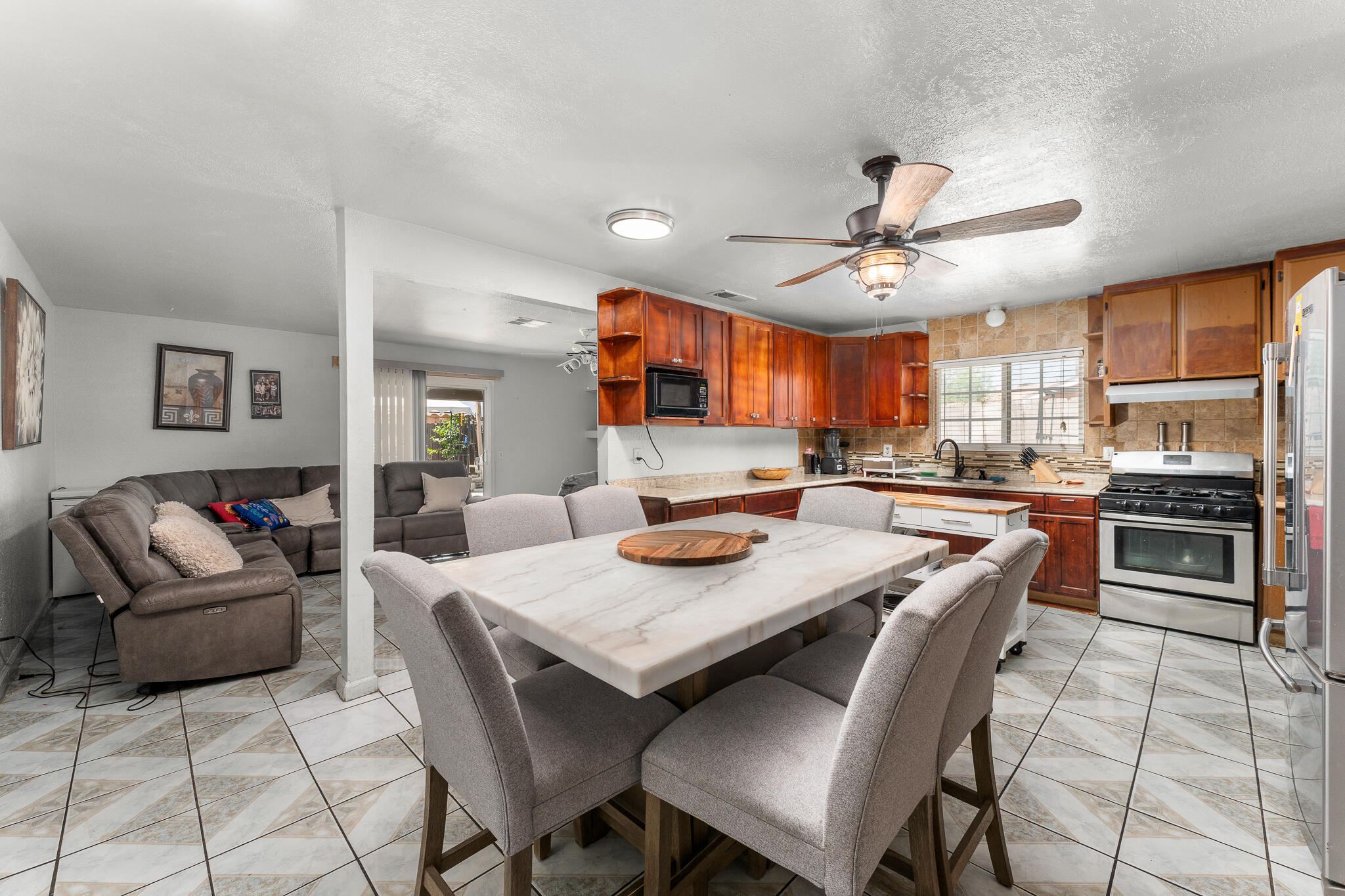 83307 Tourmaline Avenue Indio, CA 92201 - Photo 16 of 38 a view of a dining room with furniture