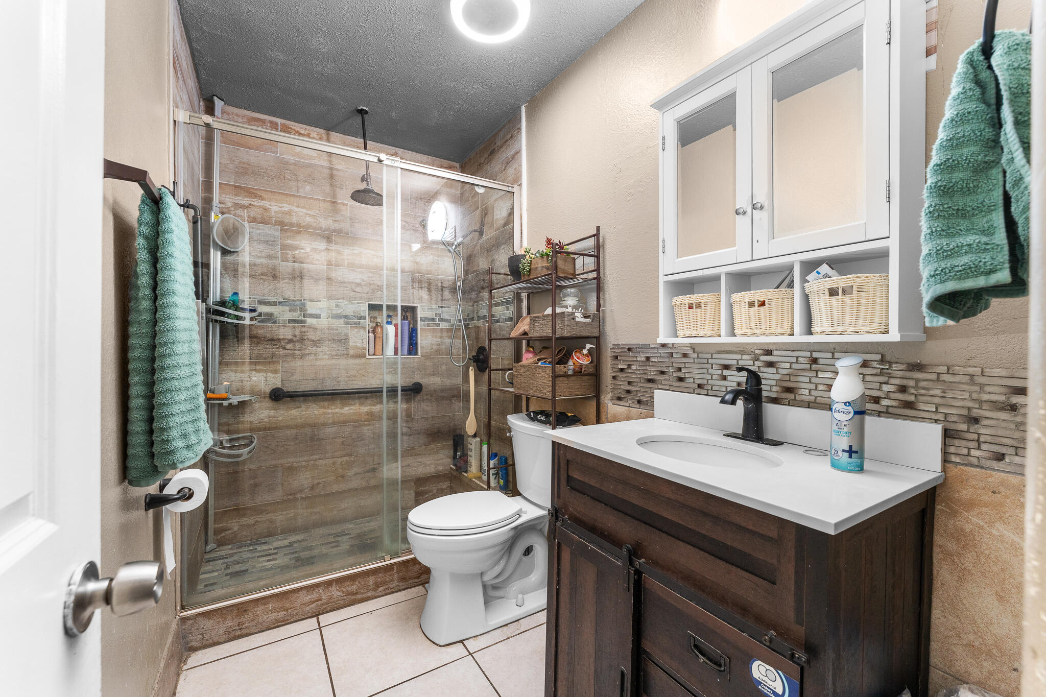 83307 Tourmaline Avenue Indio, CA 92201 - Photo 24 of 38 a bathroom with a sink toilet and shower