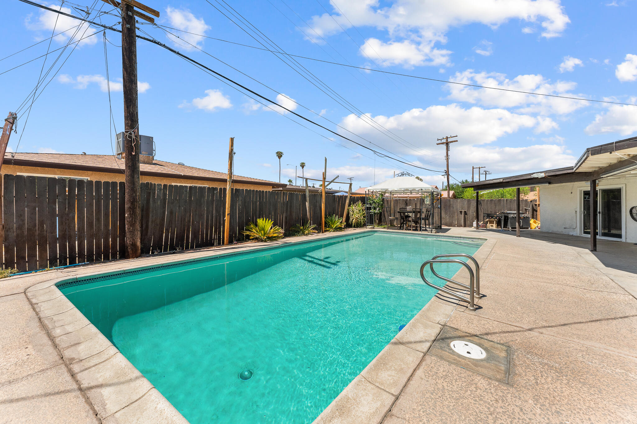 83307 Tourmaline Avenue Indio, CA 92201 - Photo 31 of 38 a house view with a backyard space