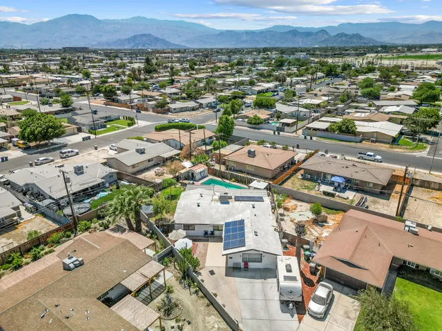 an aerial view of a city with lots of residential buildings