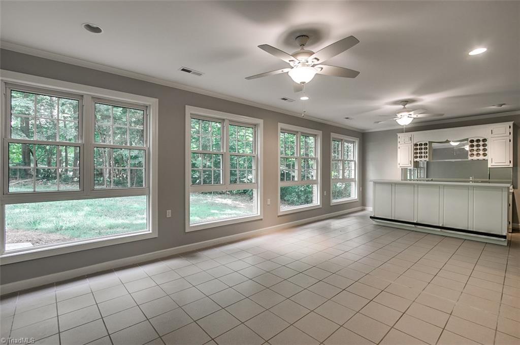 2601 Kilpatrick White Road Greensboro, NC 27406 - Photo 22 of 30 This beautiful game/billiards room has a wet bar and custom windows. Great for games and entertaining!