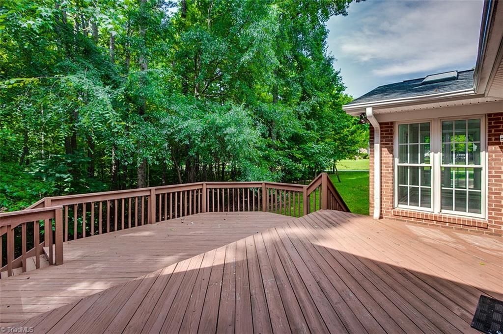2601 Kilpatrick White Road Greensboro, NC 27406 - Photo 29 of 30 Deck is partially shaded with access to the main and lower level.