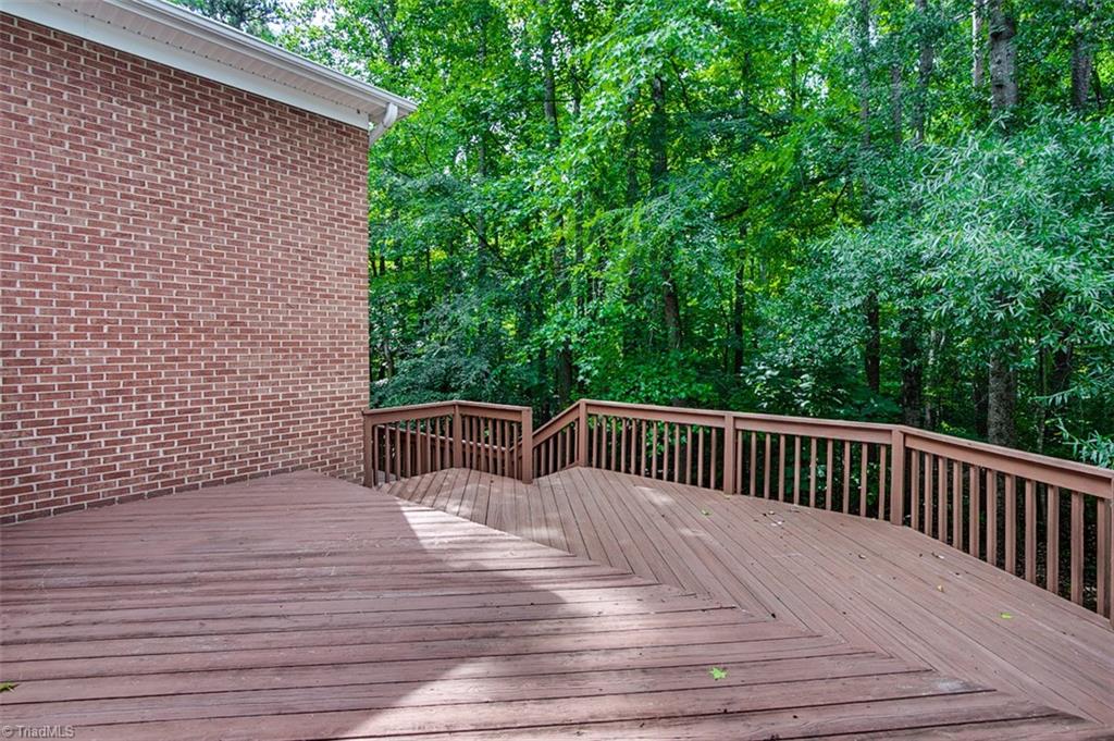 2601 Kilpatrick White Road Greensboro, NC 27406 - Photo 30 of 30 Rear deck also has access to the lower level bedroom.