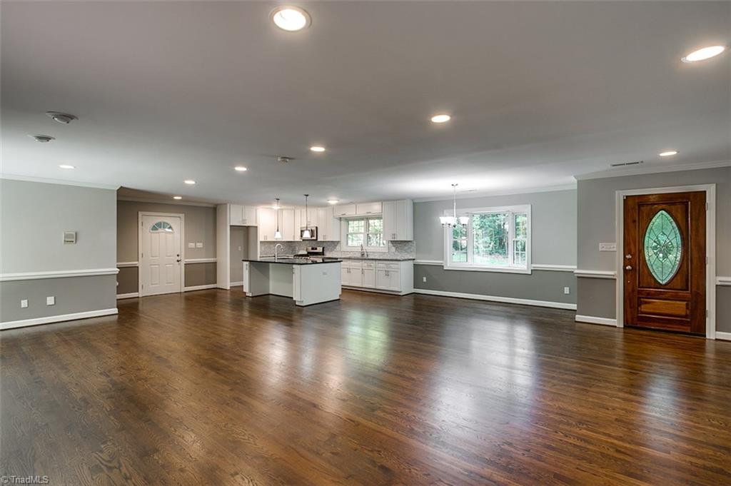 2601 Kilpatrick White Road Greensboro, NC 27406 - Photo 4 of 30 These breathtaking hardwood floors are throughout the main level. Recessed and pendant lighting accent the granite island and open kitchen.