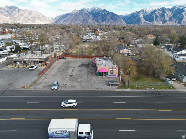 8475 South State Street Sandy, UT 84070 - Photo 18 of 31 Drone / aerial view of a mountainous background
