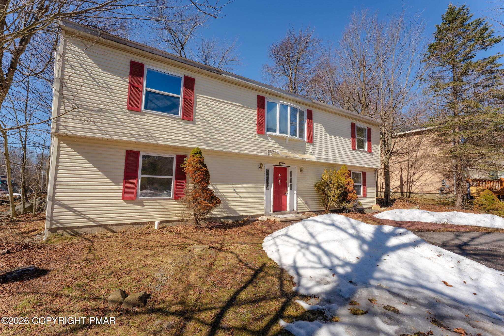 7624 Sawmill Road Tobyhanna, PA 18466 - Photo 50 of 55 a front view of a house with a yard