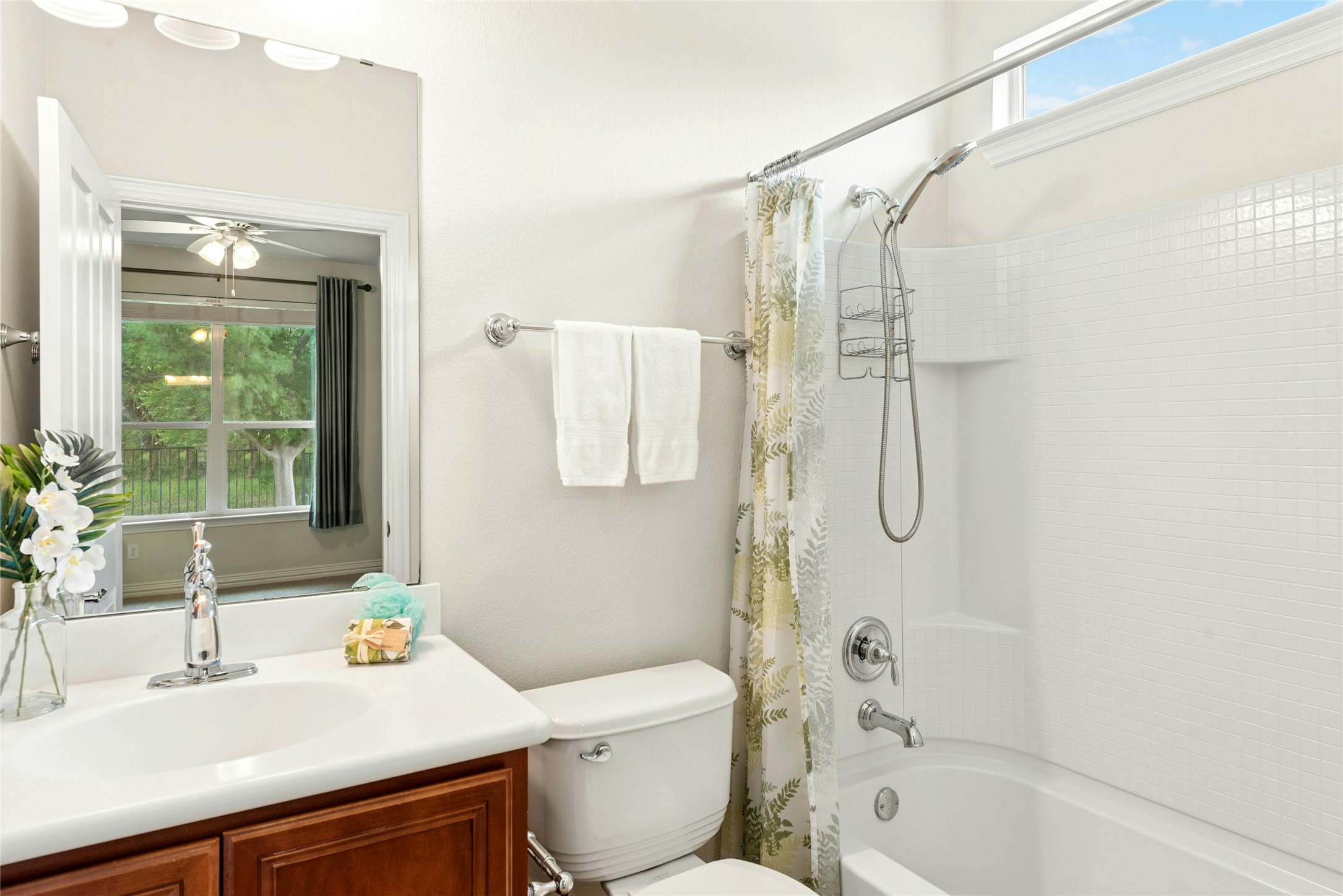 227 Duck Creek Lane Georgetown, TX 78633 - Photo 23 of 40 a bathroom with a sink toilet and shower
