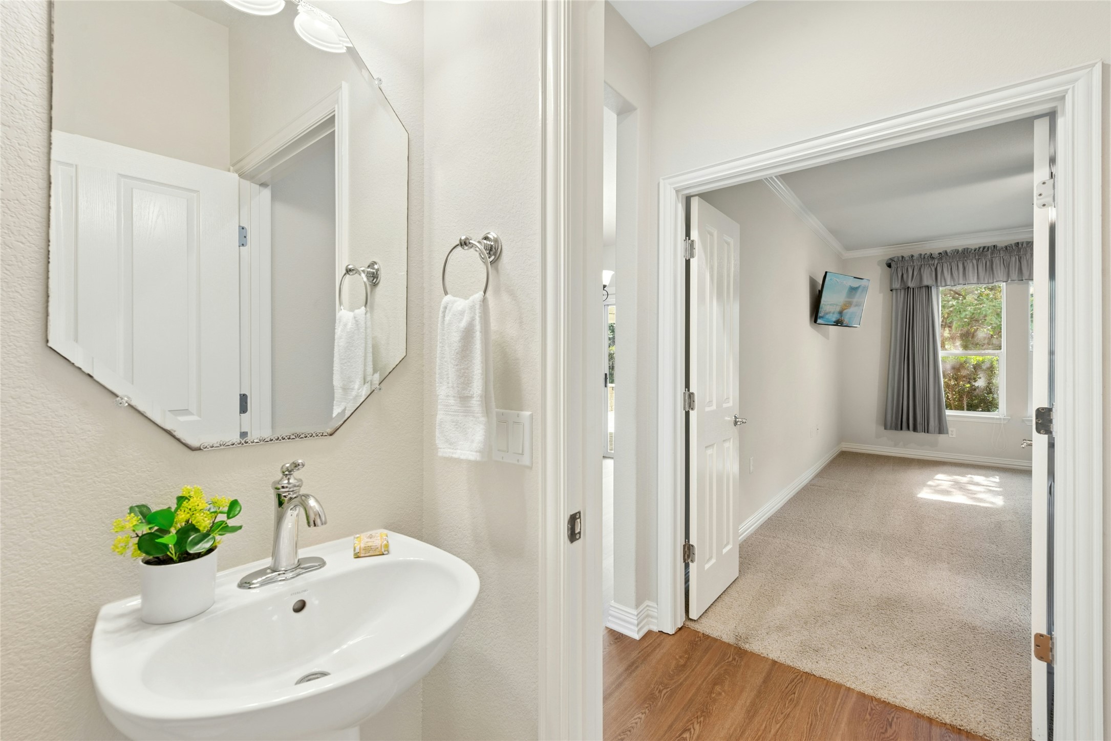 227 Duck Creek Lane Georgetown, TX 78633 - Photo 25 of 40 a bathroom with a sink and a mirror