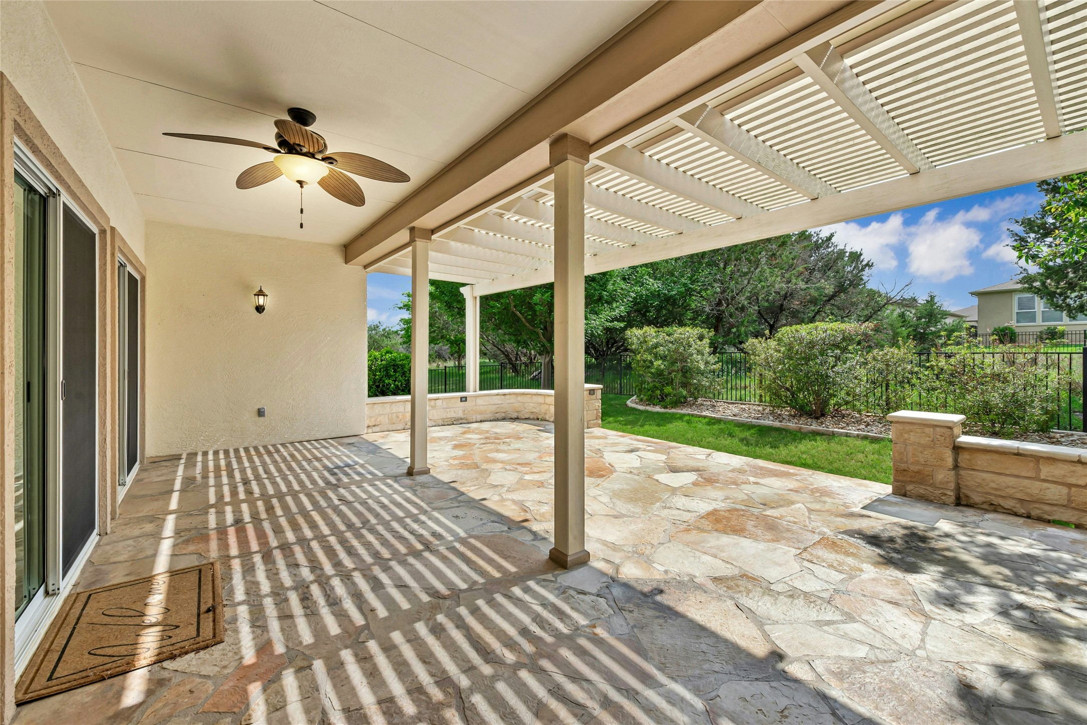 227 Duck Creek Lane Georgetown, TX 78633 - Photo 27 of 40 a view of a patio with a table and chairs