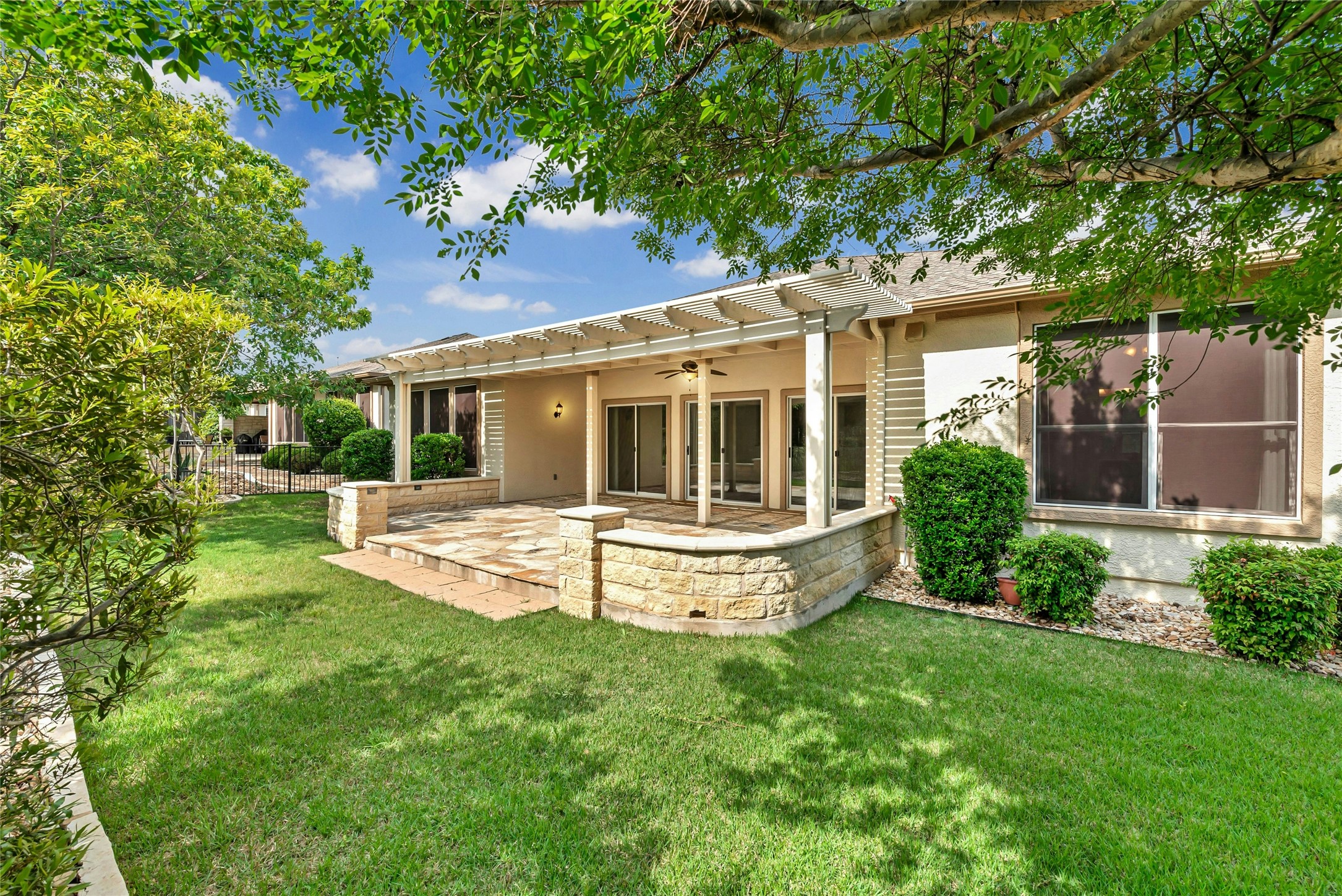 227 Duck Creek Lane Georgetown, TX 78633 - Photo 29 of 40 a view of house with a yard and potted plants