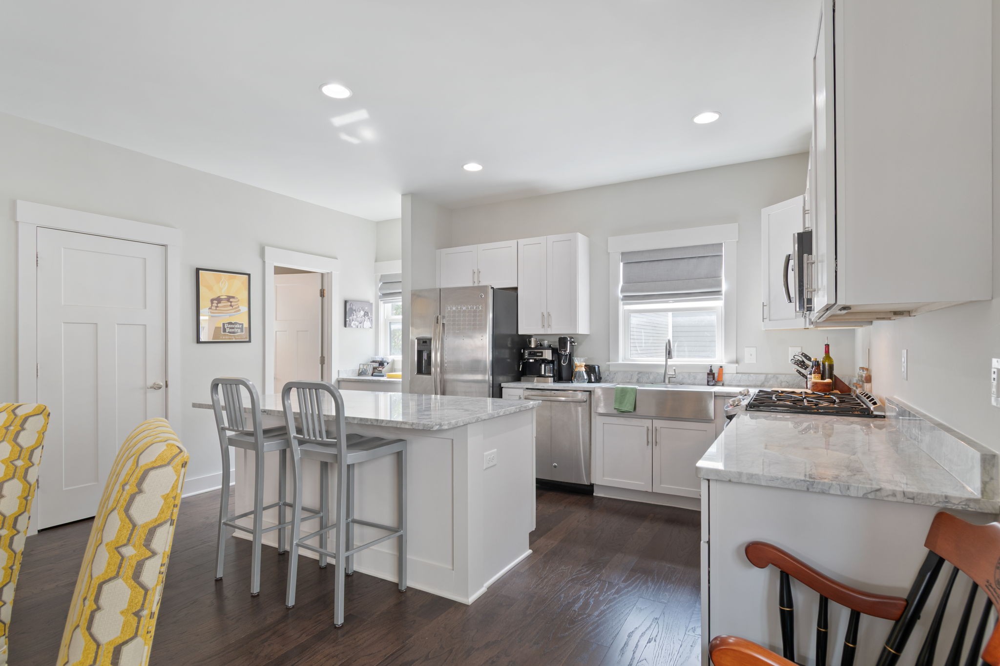 728 Centerpoint Lane Nashville, TN 37209 - Photo 20 of 45 a kitchen with appliances cabinets and chair