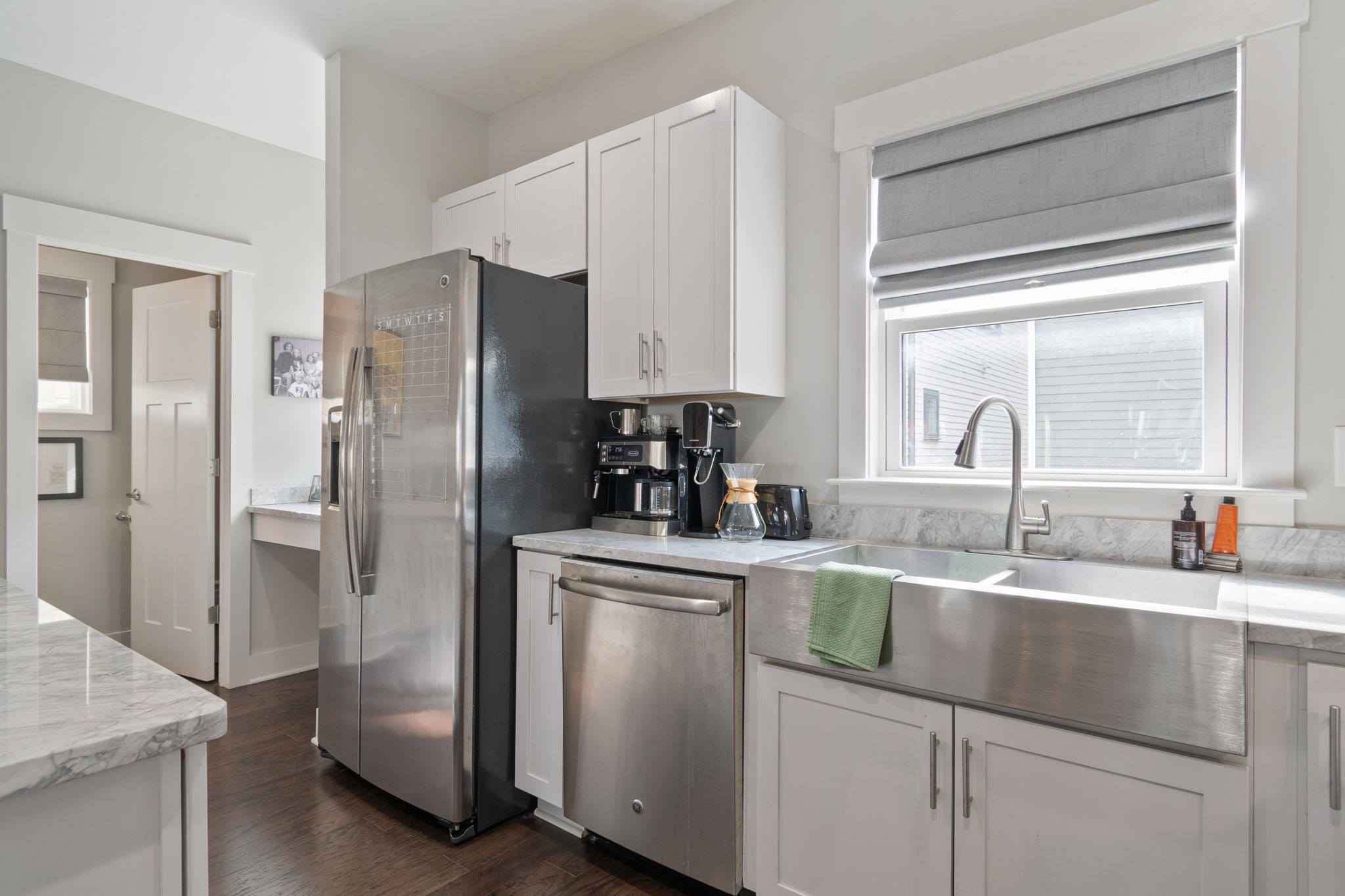 728 Centerpoint Lane Nashville, TN 37209 - Photo 27 of 45 a kitchen with stainless steel appliances granite countertop a refrigerator and a sink