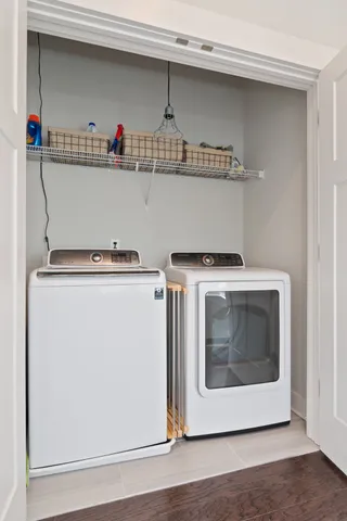 a view of hallway with wooden floor