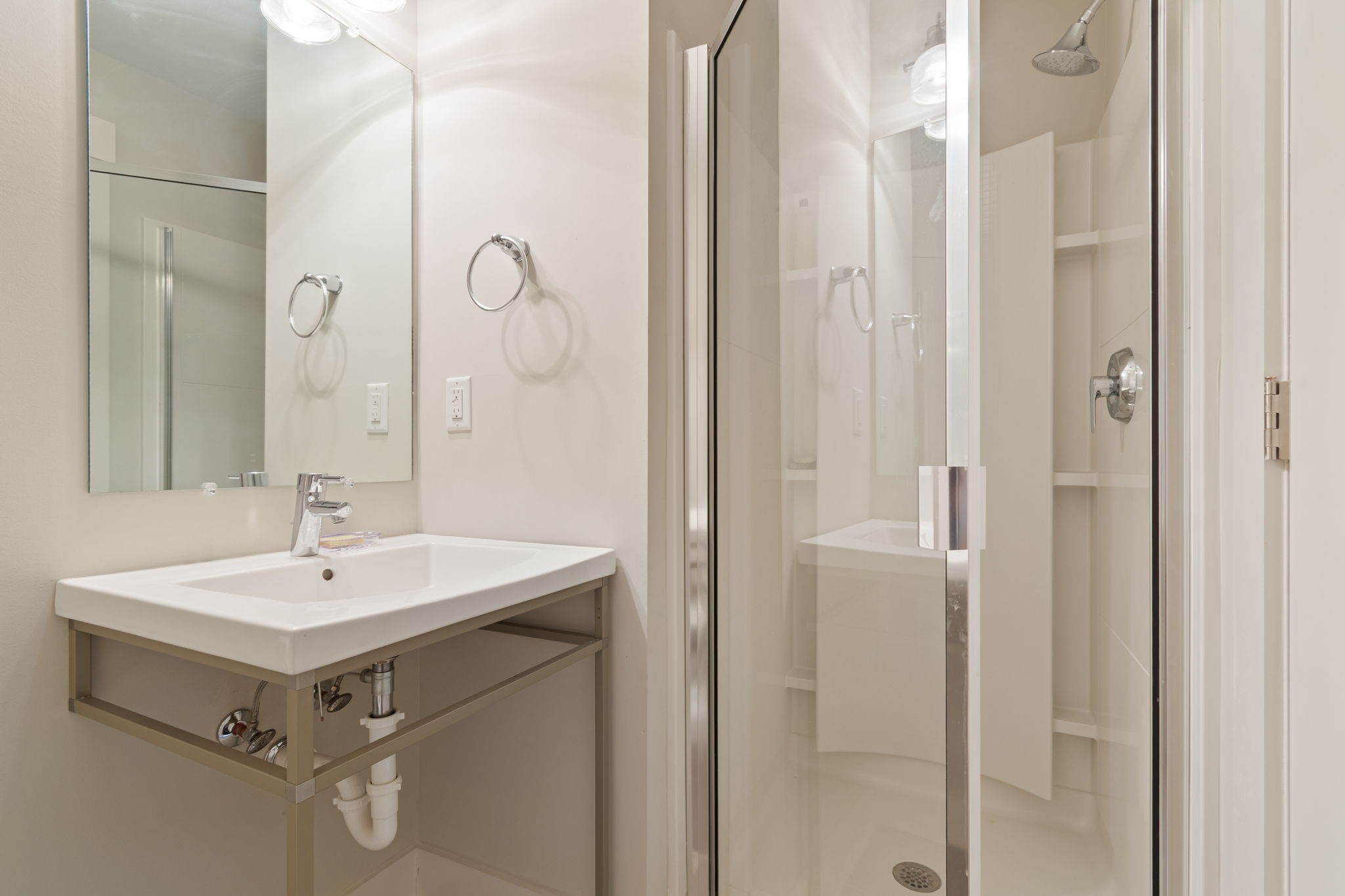 728 Centerpoint Lane Nashville, TN 37209 - Photo 10 of 45 a bathroom with a sink mirror and shower