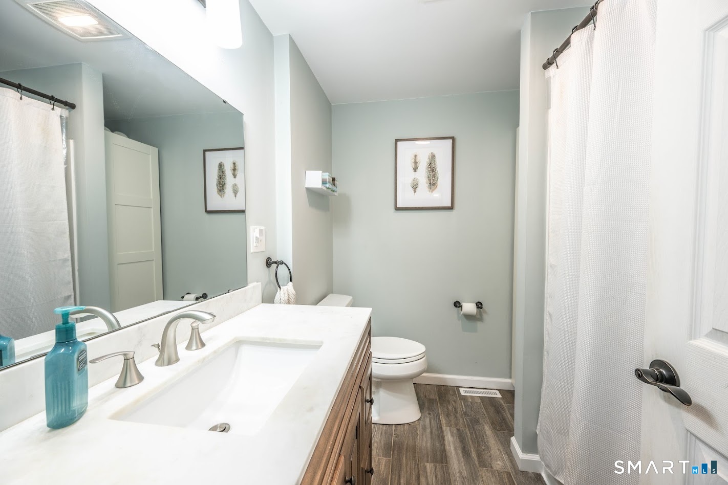 394 Brainard Hill Road Haddam, CT 06441 - Photo 17 of 23 a bathroom with a sink and a mirror