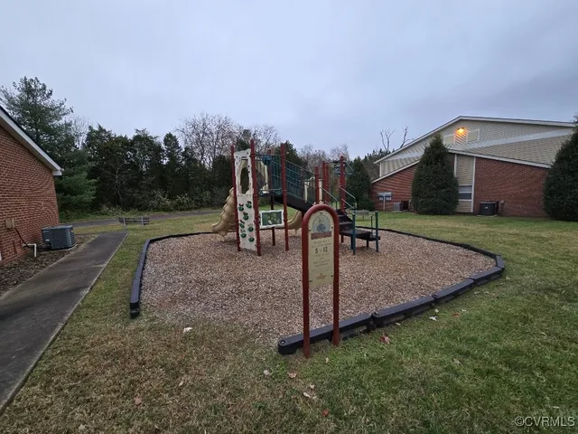 a view of a park with swings