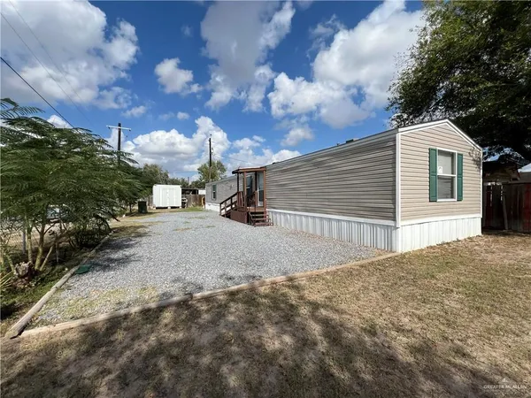 a view of backyard of house
