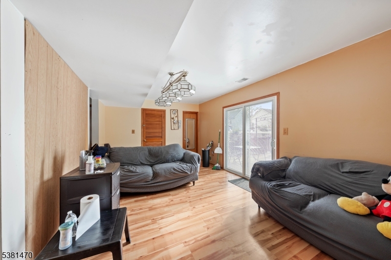 1 Hall Street Piscataway, NJ 08854 - Photo 14 of 21 a living room with furniture and a large window