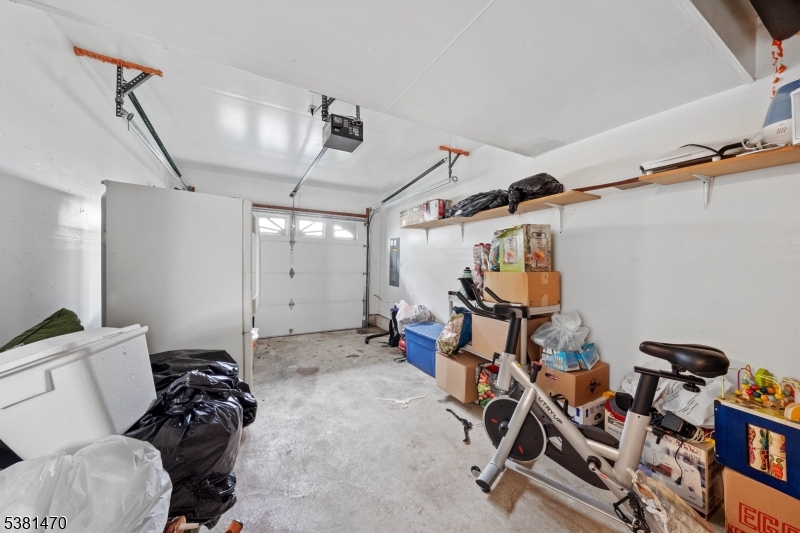 1 Hall Street Piscataway, NJ 08854 - Photo 17 of 21 a room with lots of white furniture and gym equipment