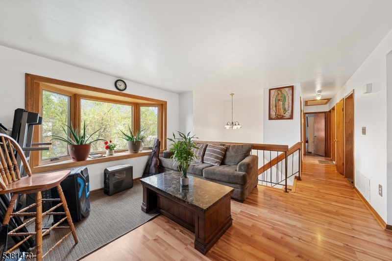 1 Hall Street Piscataway, NJ 08854 - Photo 4 of 21 a living room with furniture and a large window