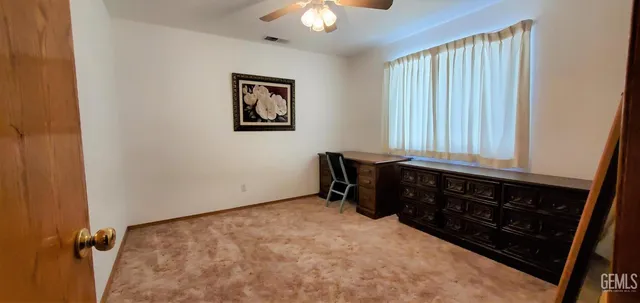 a bed room with furniture and a chandelier