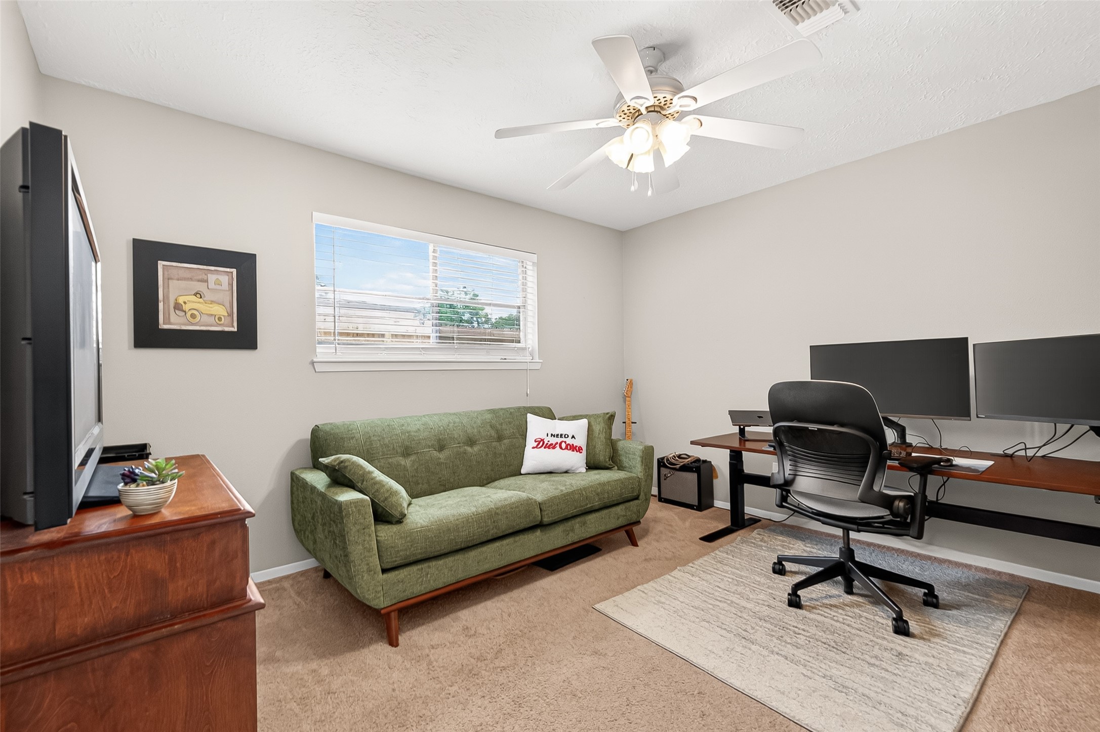 17611 Sorrell Ridge Drive Spring, TX 77388 - Photo 35 of 50 a living room with furniture and a ceiling fan