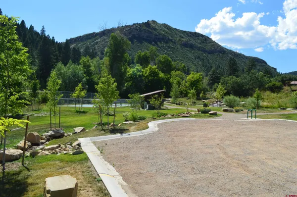 a view of lake with green space