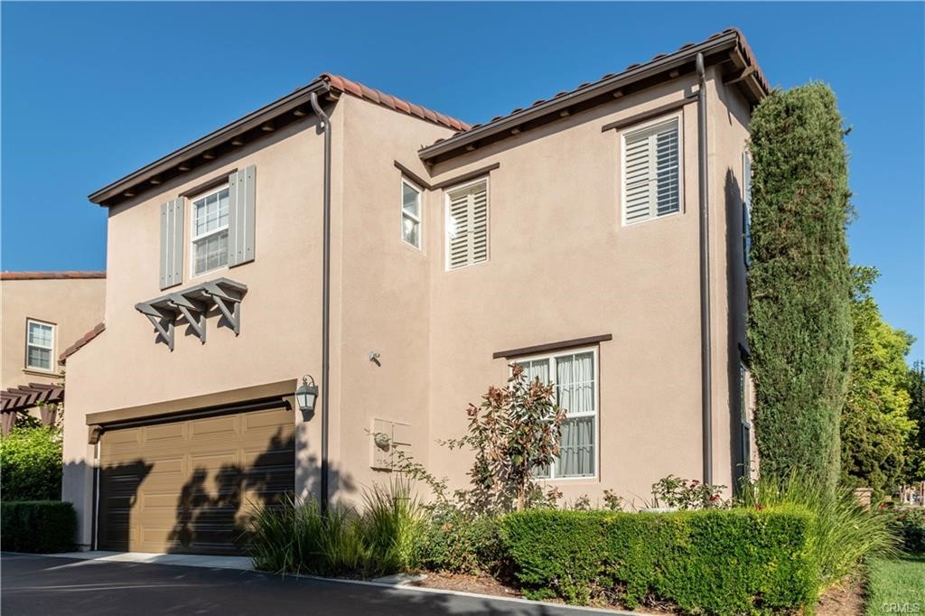 77 Canal Irvine, CA 92620 - Photo 2 of 9 a view of a house with a street