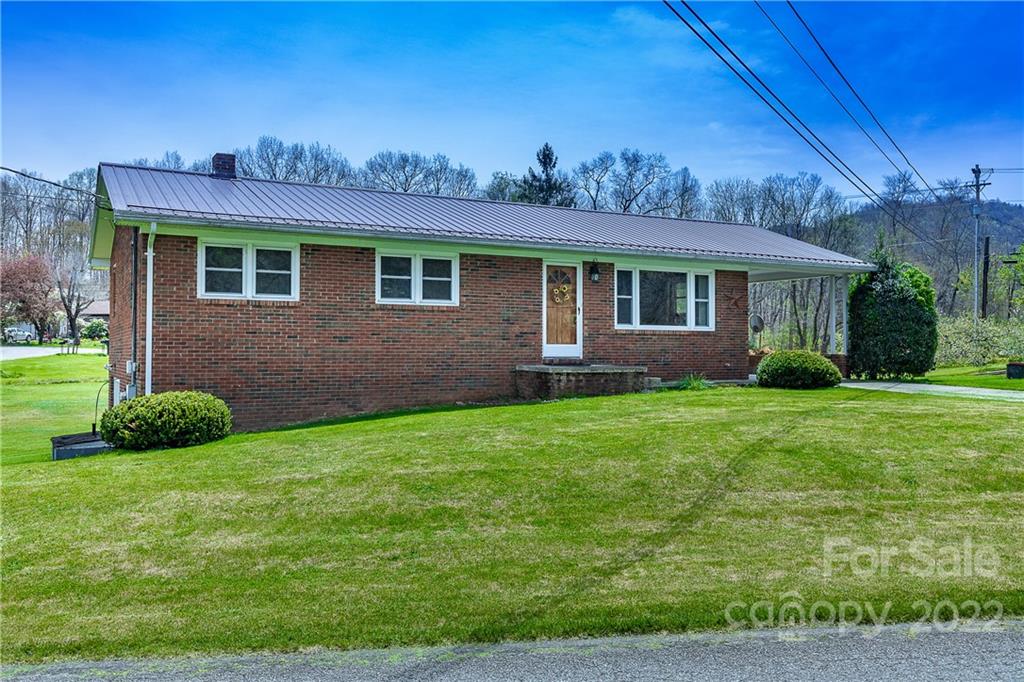 2 Riversedge Way Canton, NC 28716 - Photo 1 of 28 a front view of a house with a yard