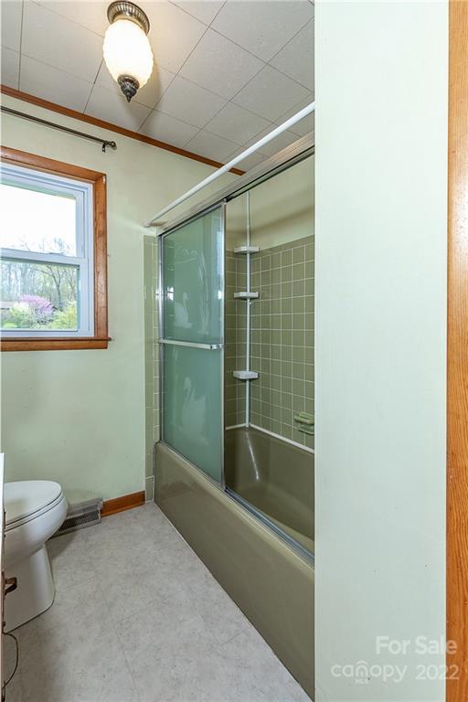 2 Riversedge Way Canton, NC 28716 - Photo 16 of 28 a bathroom with a toilet and a shower