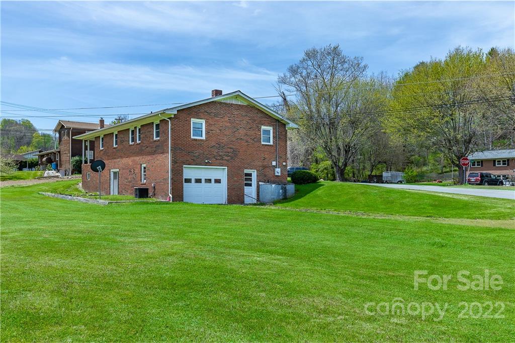 2 Riversedge Way Canton, NC 28716 - Photo 5 of 28 a front view of a house with a yard