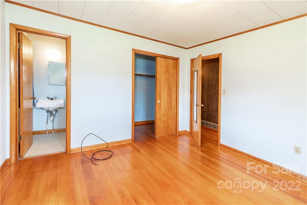 2 Riversedge Way Canton, NC 28716 - Photo 10 of 28 a view of an empty room with glass door