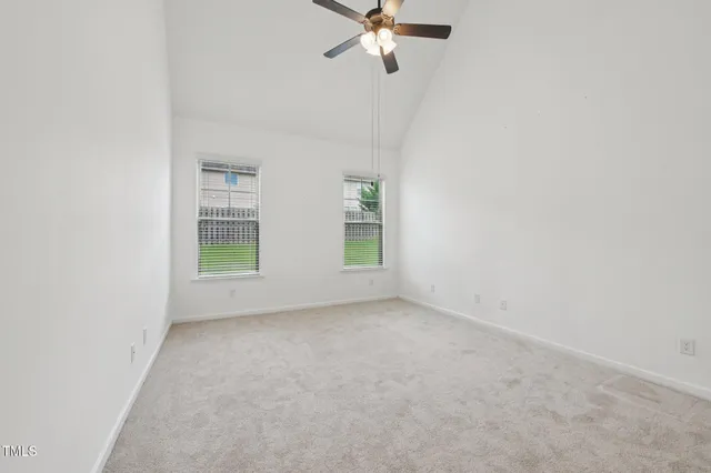 a bathroom with a glass door shower