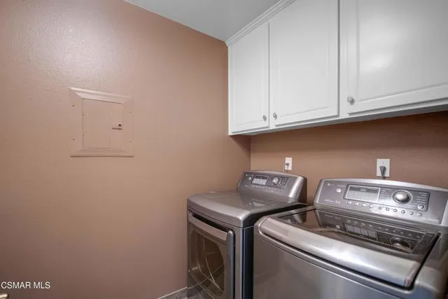 a picture of a bathroom with a shower