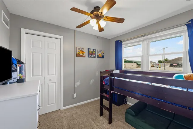 a room with furniture and a window