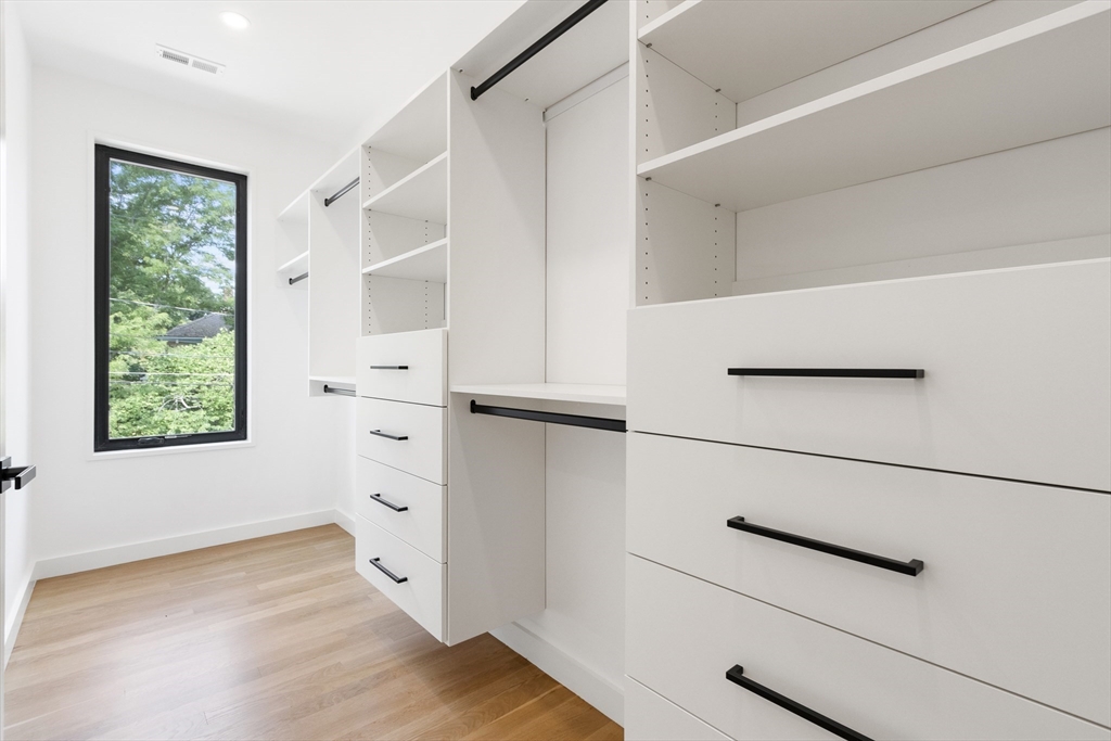 22 Appleton Street, Unit 1 Waltham, MA 02453 - Photo 18 of 36 a view of an empty walk in closet