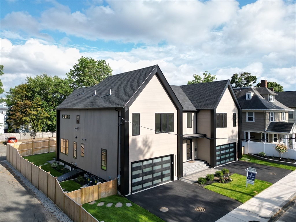 22 Appleton Street, Unit 1 Waltham, MA 02453 - Photo 2 of 36 a view of house with yard and entertaining space