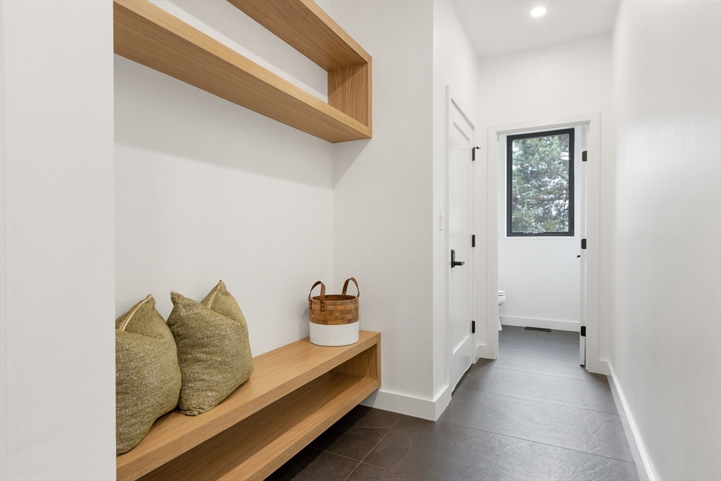 22 Appleton Street, Unit 1 Waltham, MA 02453 - Photo 4 of 36 a living room with furniture