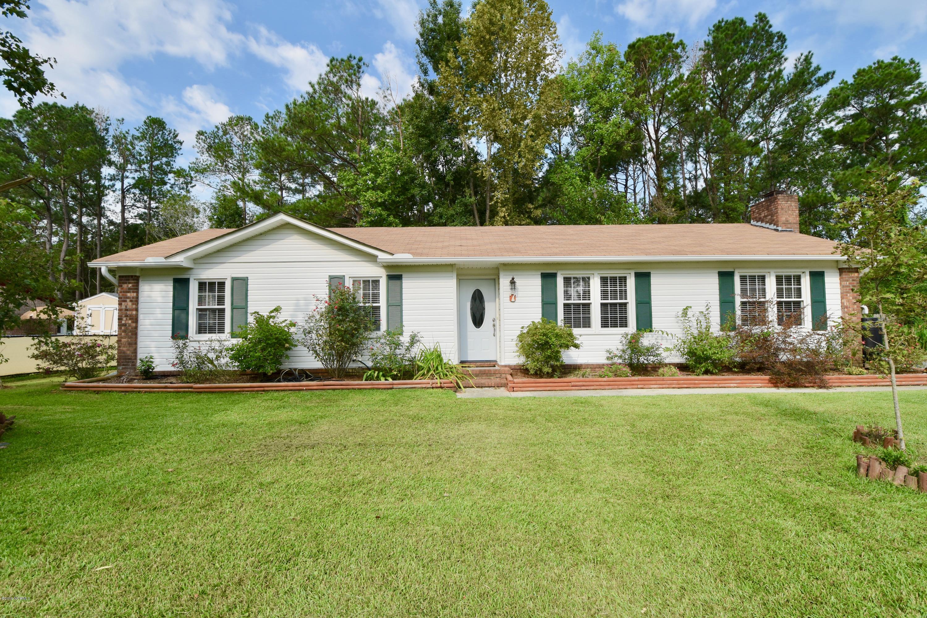 7 Logan Road Castle Hayne, NC 28429 - Photo 1 of 41 Beautiful well landscaped yard