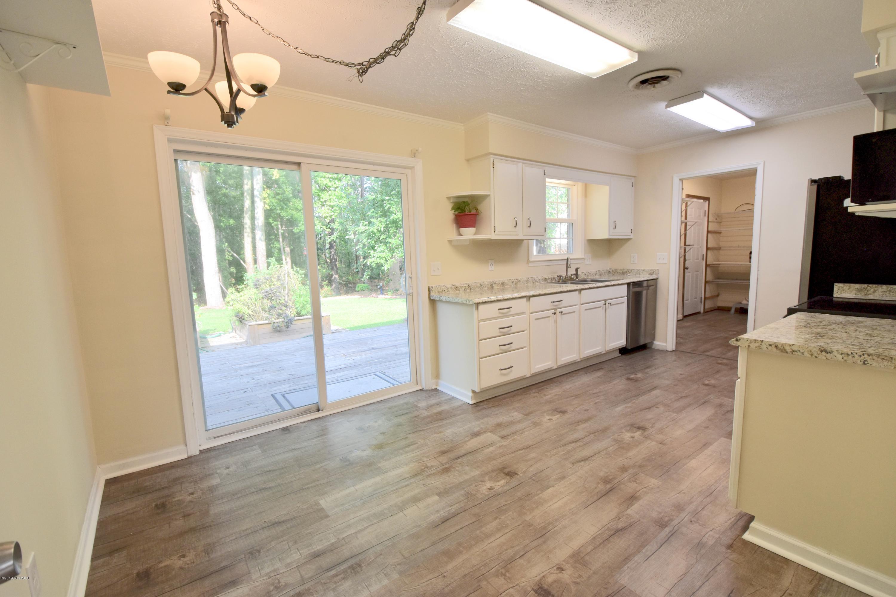7 Logan Road Castle Hayne, NC 28429 - Photo 8 of 41 Dining area...Slider leads to patio