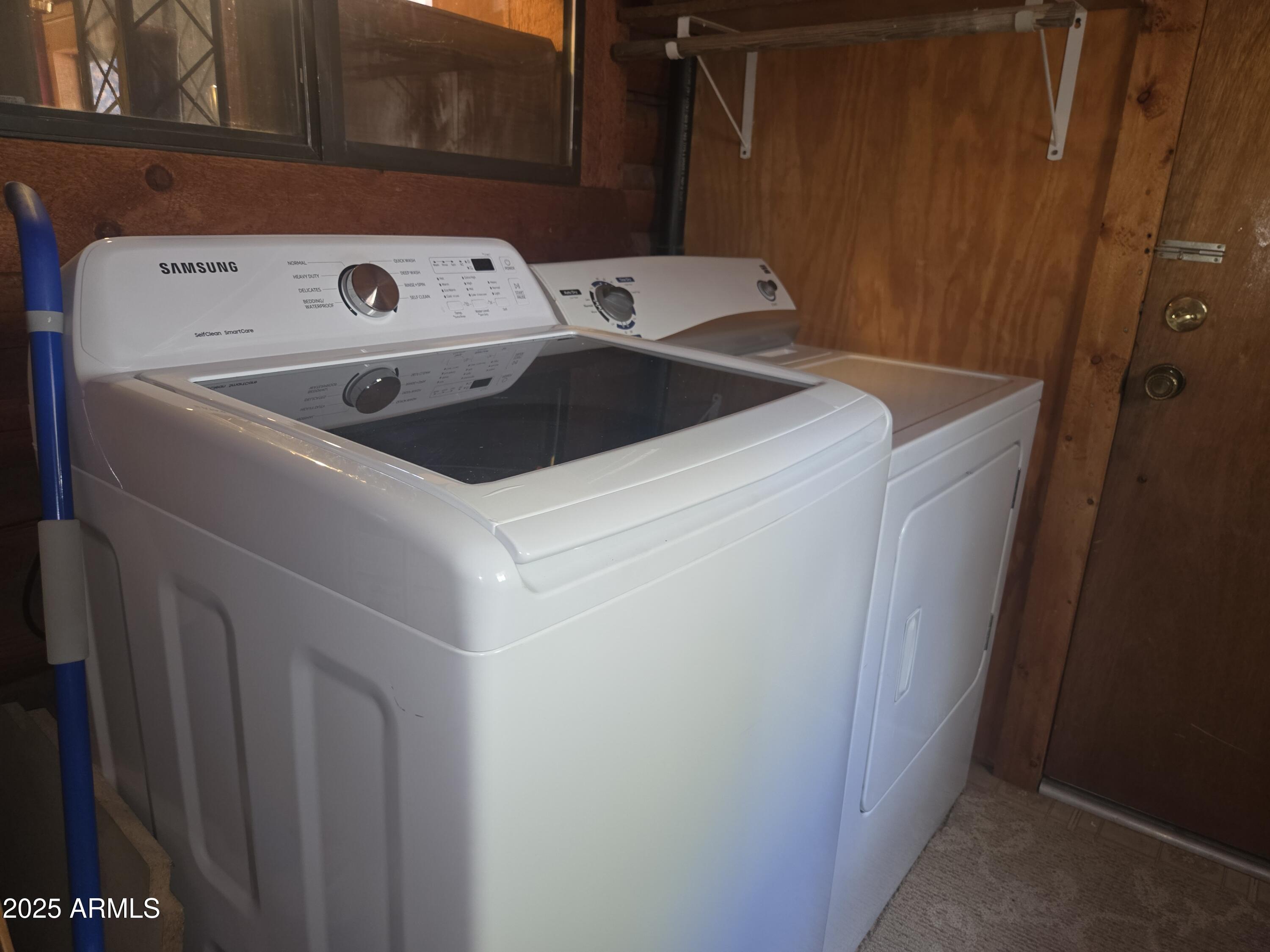 2145 Fishermans Road Overgaard, AZ 85933 - Photo 22 of 28 a utility room with dryer and washer