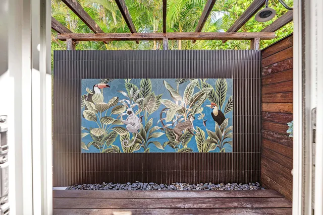 a view of a door and a black umbrella