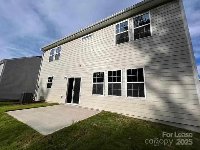 a front view of a house with yard