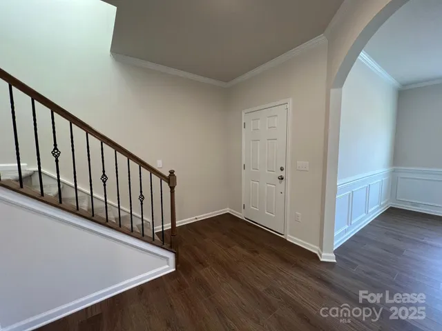 a view of a hallway with entryway